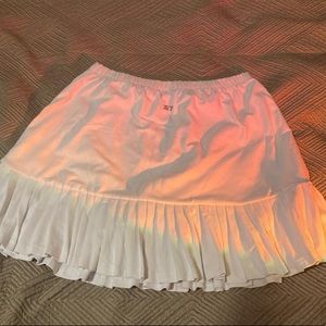 White tennis skirt in size small by the brand tail
